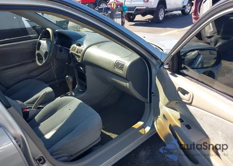 2000 Toyota Corolla Ce z USA, uszkodzony, nr VIN 2T1BR12E3YC301957